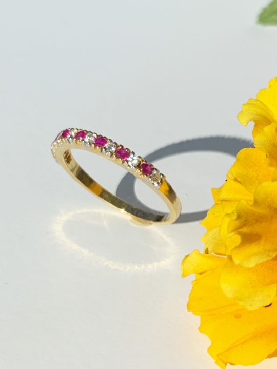 Ruby diamond infinity ring in yellow gold